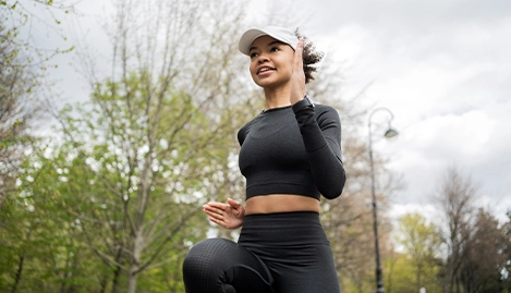 Woman Athlete Training Running Outdoors In Sportswear